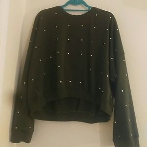Cropped green sweater